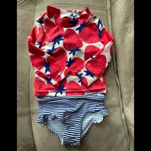 Just one you by carters. 6 month swimming suit. She wore it once ☺️